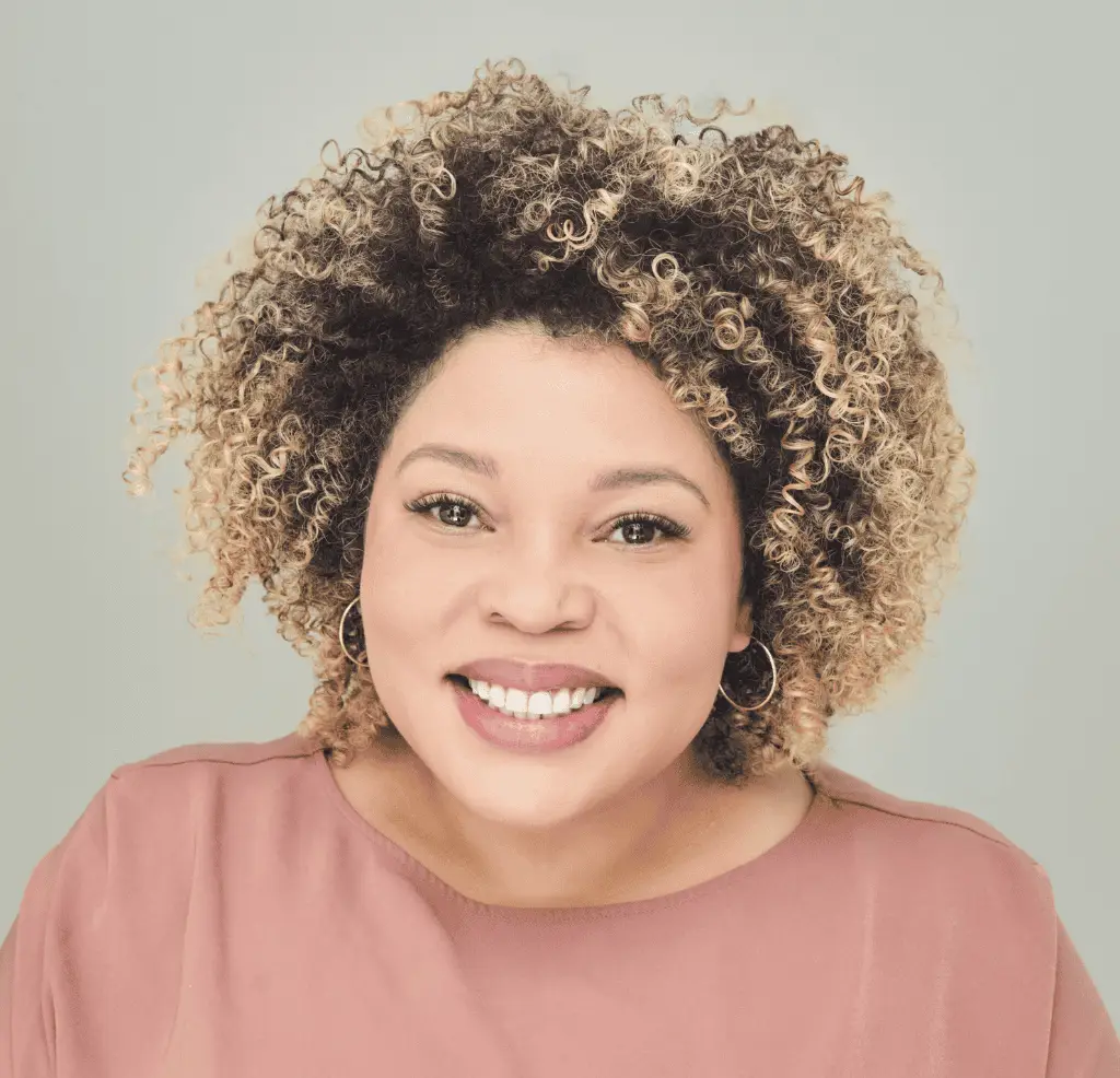 Professional craniosacral therapist smiling, part of Our Team at MyBaby CST.